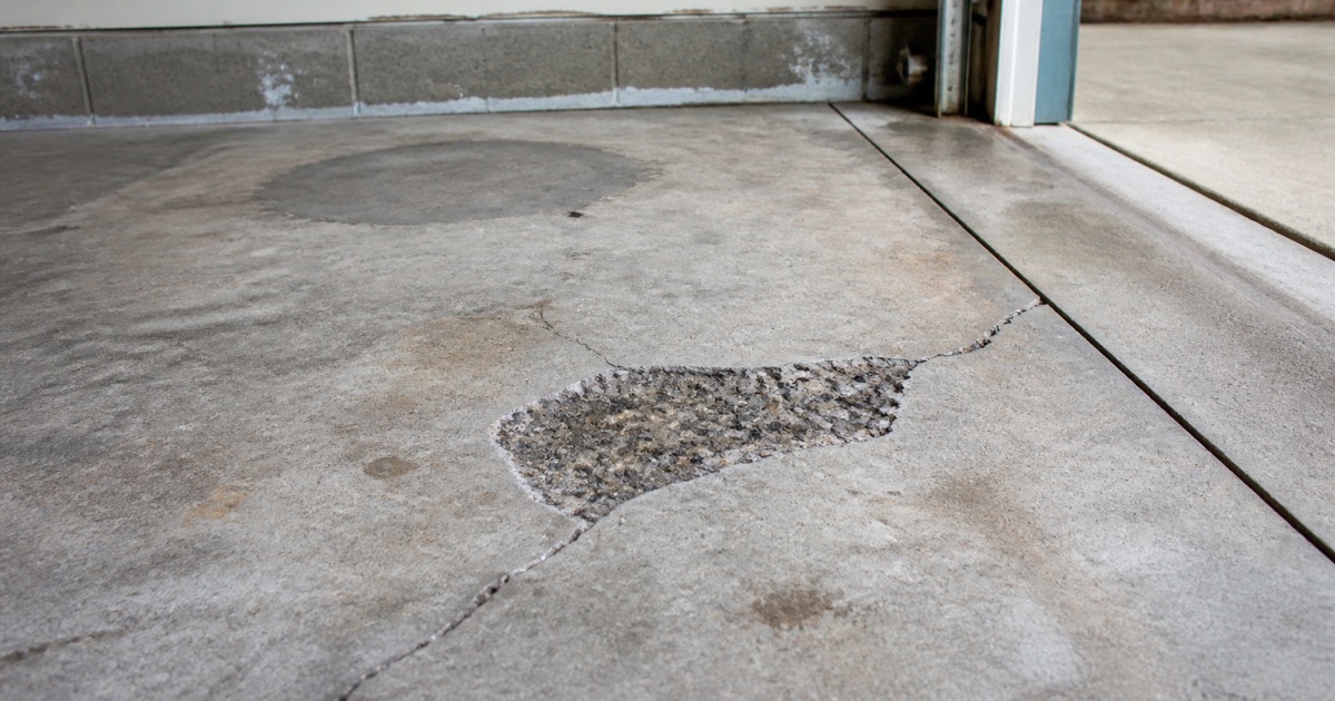 spalled 1950s slab, repair before coating